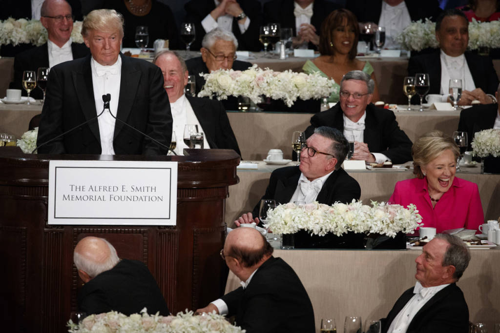 Democratic presidential candidate Hillary Clinton, right, reacts as Republican presidential candidate Donald Trump speaks during the Alfred E. Smith Memorial Foundation dinner, Thursday, Oct. 20, 2016, in New York. (AP Photo/ Evan Vucci)