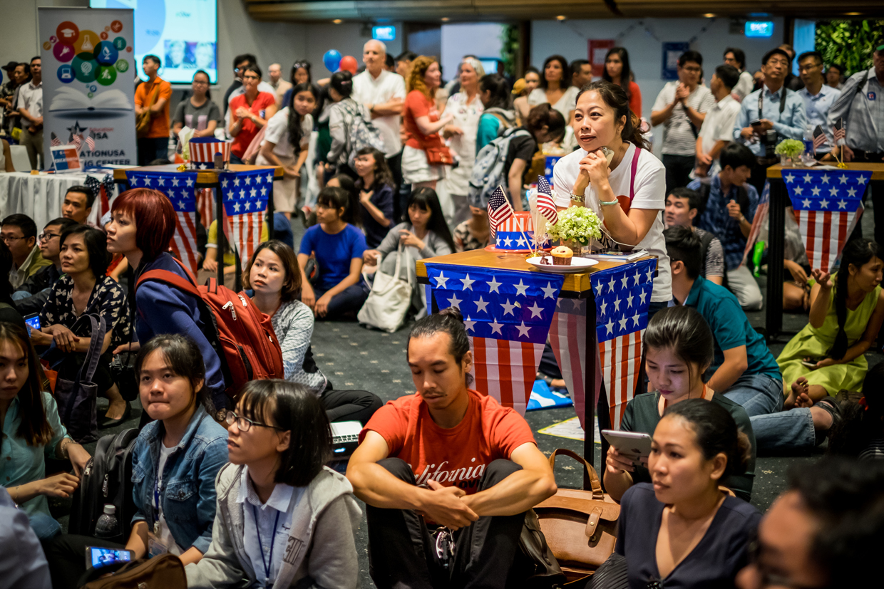 HO CHI MINH CITY, VIETNAM - NOVEMBER 09: People watch live election results hosted by the United States Consulate General at a convention center on November 9, 2016 in Ho Chi Minh City, Vietnam. Donald Trump's stunning performance in the US presidential election triggered shock and angst in Asia, where observers fretted over the implications for everything from trade to human rights and climate change. (Photo by Linh Pham/Getty Images)