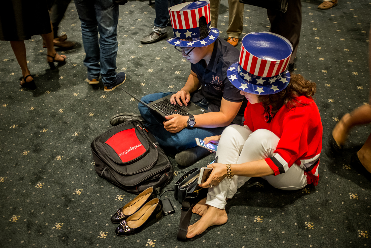 HO CHI MINH CITY, VIETNAM - NOVEMBER 09: People watch live election results hosted by the United States Consulate General at a convention center on November 9, 2016 in Ho Chi Minh City, Vietnam. Donald Trump's stunning performance in the US presidential election triggered shock and angst in Asia, where observers fretted over the implications for everything from trade to human rights and climate change. (Photo by Linh Pham/Getty Images)