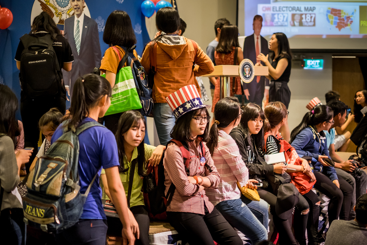 HO CHI MINH CITY, VIETNAM - NOVEMBER 09: People watch live election results hosted by the United States Consulate General at a convention center on November 9, 2016 in Ho Chi Minh City, Vietnam. Donald Trump's stunning performance in the US presidential election triggered shock and angst in Asia, where observers fretted over the implications for everything from trade to human rights and climate change. (Photo by Linh Pham/Getty Images)