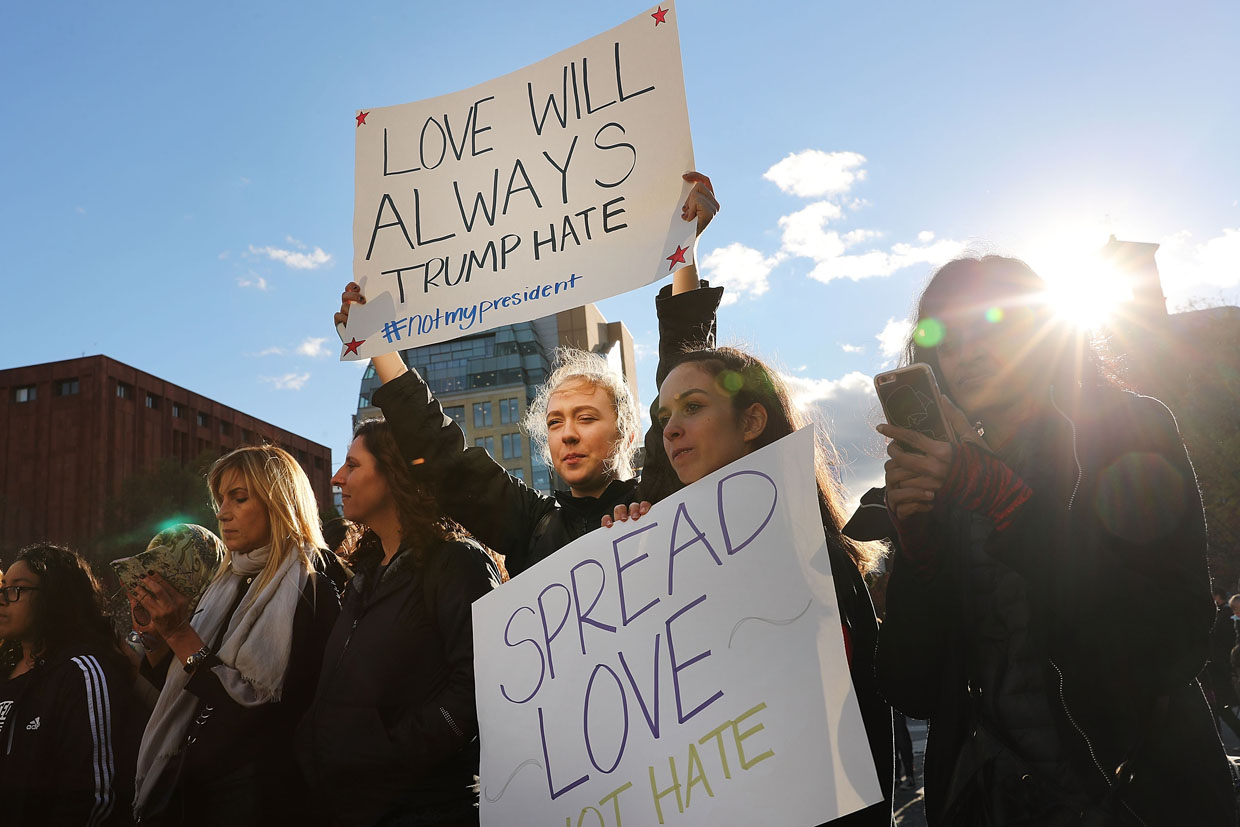 NEW YORK, NY - NOVEMBER 11: Hundreds of anti-Donald Trump protesters hold a demonstration in Washington Square Park as New Yorkers react to the election of Donald Trump as president of the United States on November 11, 2016 in New York City. The election of Trump as president has sparked protests in cities across the country. (Photo by Spencer Platt/Getty Images)