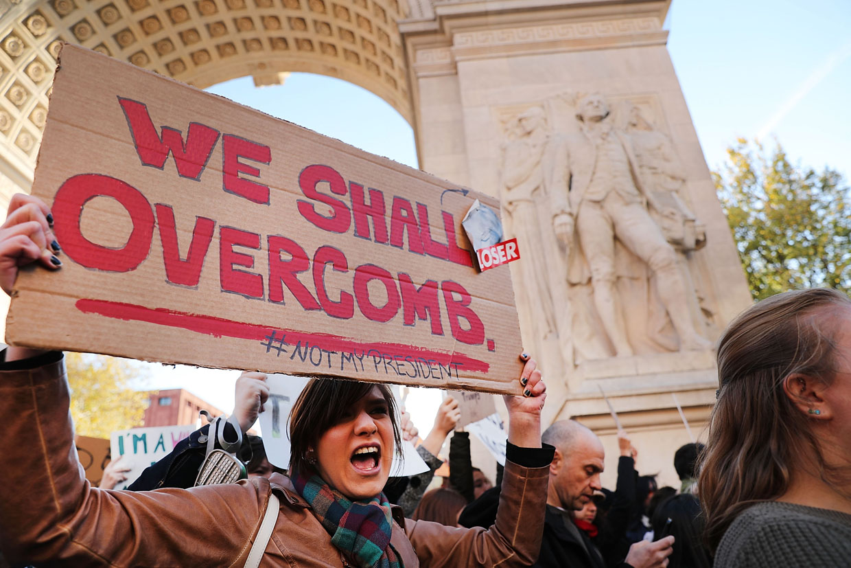 NEW YORK, NY - NOVEMBER 11: Hundreds of anti-Trump protesters hold a demonstration in Washington Square Park as New Yorkers react to the election of Donald Trump as president of the United States on November 11, 2016 in New York City. The election of Trump as president has sparked protests in cities across the country.(Photo by Spencer Platt/Getty Images)