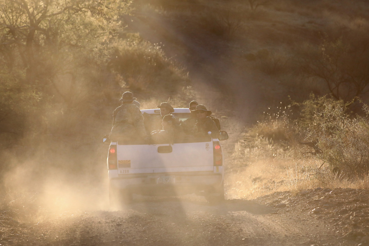 ARIVACA, AZ - NOVEMBER 14: Civilian paramilitaries with Arizona Border Recon deploy for an operation near the U.S.-Mexico border on November 14, 2016 near Arivaca, Arizona. The armed group, made up mostly of former U.S. military servicemen and women, stages reconnaissance and surveillance operations against drug and human smuggling operations in remote border areas. The group, with up to 200 volunteers, does not consider itself a militia, but rather a group of citizens supplementing U.S. Border Patrol efforts to control illegal border activity. With the election of Donald Trump as President, border security issues are a top national issue for the incoming Administration. (Photo by John Moore/Getty Images)