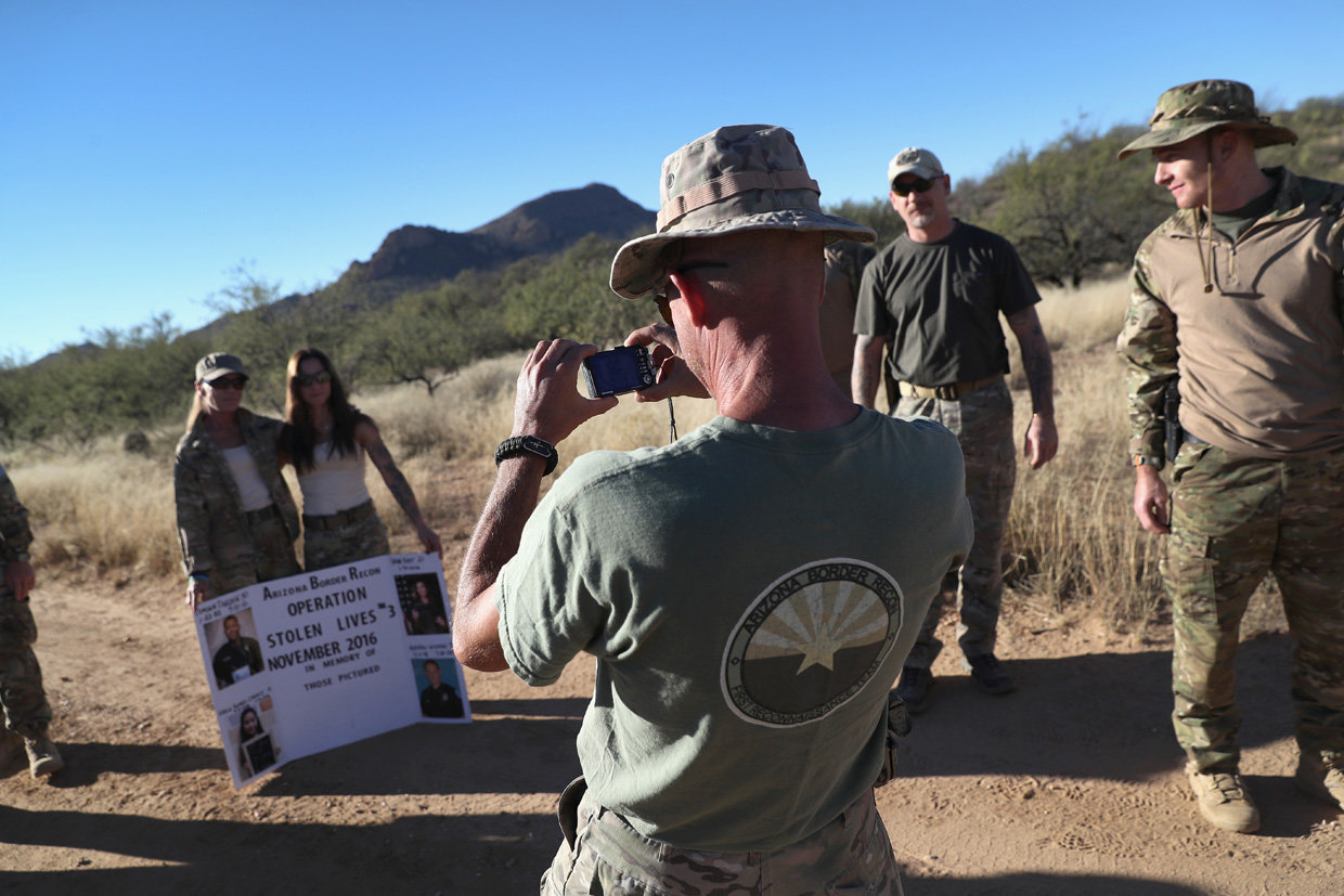 ARIVACA, AZ - NOVEMBER 15: Civilian paramilitaries with Arizona Border Recon take group photos at their camp at the U.S.-Mexico border on November 15, 2016 near Arivaca, Arizona. The armed group, made up mostly of former U.S. military servicemen and women, stages intelligence and reconnaissance operations against drug and human smuggling operations in remote border areas. The group, which claims up to 200 volunteers, does not consider itself a militia, but rather a group of citizens supplementing U.S. Border Patrol efforts to counter illegal border activity. With the election of Donald Trump as President, border security issues are a top national issue for the incoming Administration. (Photo by John Moore/Getty Images)