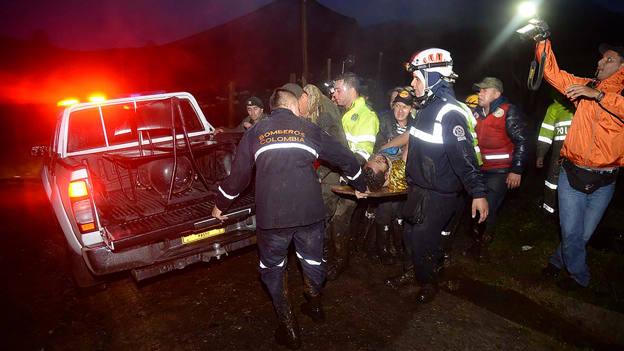 Rescuers carry one of the survivors from the LAMIA airlines charter plane carrying members of the Chapecoense Real football team that crashed in the mountains of Cerro Gordo, municipality of La Union, on November 29, 2016. A charter plane carrying the Chapocoense Real football team crashed in the mountains in Colombia late Monday, killing as many as 75 people, officials said. / AFP / Raul ARBOLEDA (Photo credit should read RAUL ARBOLEDA/AFP/Getty Images)