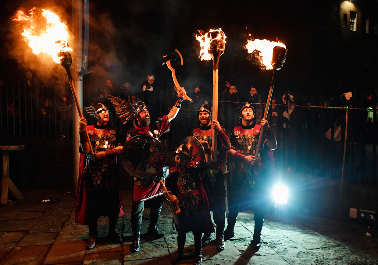 EDINBURGH, SCOTLAND - DECEMBER 30: Up Helly Aa Vikings prepare to take part during a torchlight procession through Edinburgh for the start of the Hogmanay celebrations on December 30, 2016 in Edinburgh, Scotland. It is expected to bring in 150,000 visitors from more than 80 countries to the city for the traditional New Year celebrations, which run over three days. (Photo by Jeff J Mitchell/Getty Images)