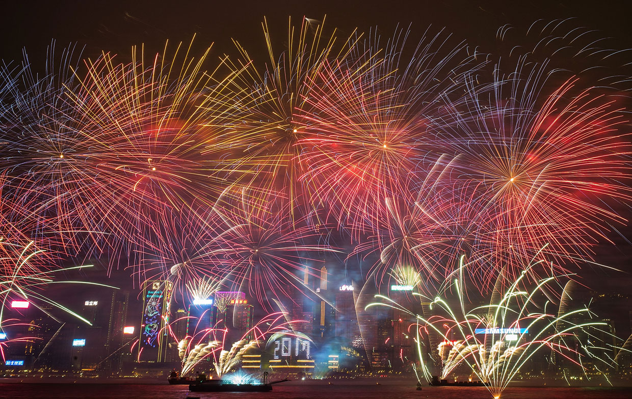 HONG KONG - JANUARY 01: Fireworks illuminate the city's skyline during BOCHK Hong Kong New Year countdown celebrations of 2017 on January 1, 2017 in Hong Kong. (Photo by Lam Yik Fei/Getty Images)