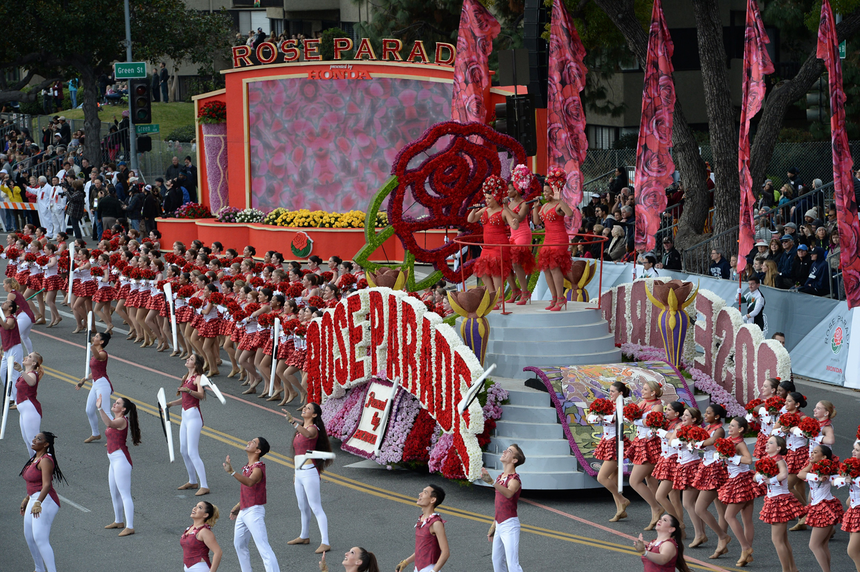 The "Rose Cast" of 250 performers opens the 128th Rose Parade in Pasadena, California, January 2, 2017. The Rose Parade, also known as the Tournament of Roses Parade, is part of "America's New Year Celebration" held in Pasadena, California each year on New Year's Day, or on January 2 if New Year's Day falls on a Sunday. The parade's Never on Sunday tradition dates to 1893, the first year since the start of the event that New Years Day fell on a Sunday. To avoid frightening horses that would be hitched outside churches on a Sunday the parade was moved to the next day, January 2. / AFP / Robyn Beck (Photo credit should read ROBYN BECK/AFP/Getty Images)