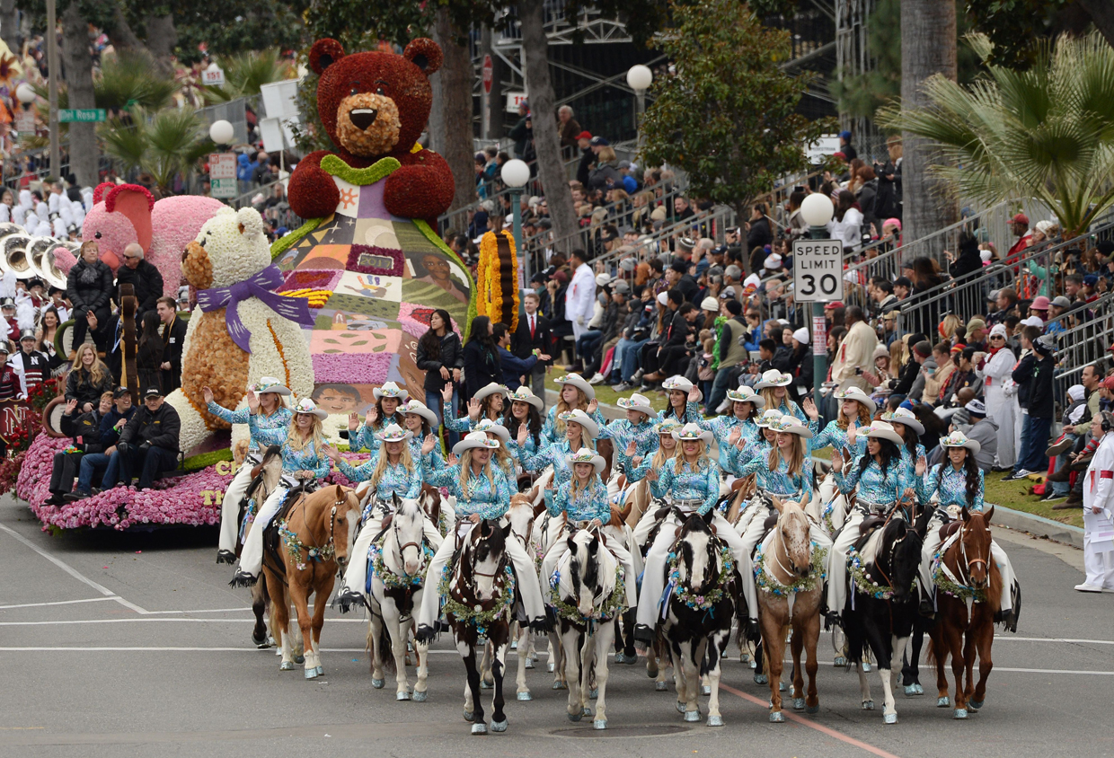 The Norco Cowgirls and The Little Miss Norco Cowgirls Rodeo Drill Team participate in the 128th Rose Parade in Pasadena, California, January 2, 2017. The Rose Parade, also known as the Tournament of Roses Parade, is part of "America's New Year Celebration" held in Pasadena, California each year on New Year's Day, or on January 2 if New Year's Day falls on a Sunday. The parade's Never on Sunday tradition dates to 1893, the first year since the start of the event that New Years Day fell on a Sunday. To avoid frightening horses that would be hitched outside churches on a Sunday the parade was moved to the next day, January 2. / AFP / Robyn Beck (Photo credit should read ROBYN BECK/AFP/Getty Images)
