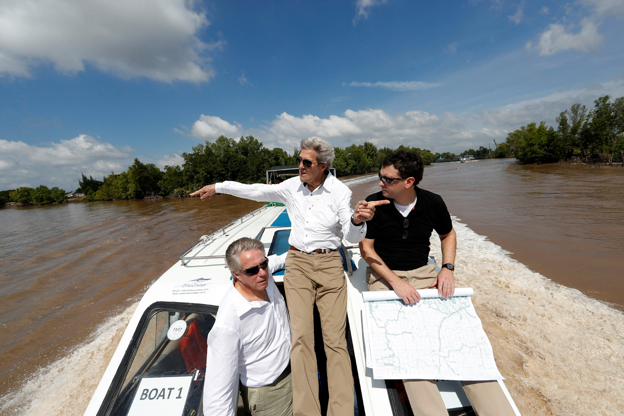 Secretary of State John Kerry, center, rides a boat with Senior Advisor to the Secretary David Thorne, and Dartmouth College associate professor of history Edward Miller, Saturday, Jan. 14, 2017 in the Mekong River Delta, Vietnam. Kerry once patrolled these waters on a U.S. naval gunboat and received the Silver Star for his actions. (AP Photo/Alex Brandon, Pool) / AFP / AP Pool / Alex Brandon (Photo credit should read ALEX BRANDON/AFP/Getty Images)