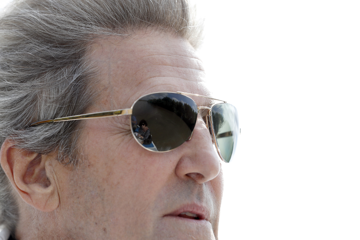 US Secretary of State John Kerry rides a boat in the Mekong River Delta on January 14, 2017. Kerry is in Vietnam, his fourth and final trip to the communist nation where he served during the war. / AFP / POOL / Alex Brandon (Photo credit should read ALEX BRANDON/AFP/Getty Images)