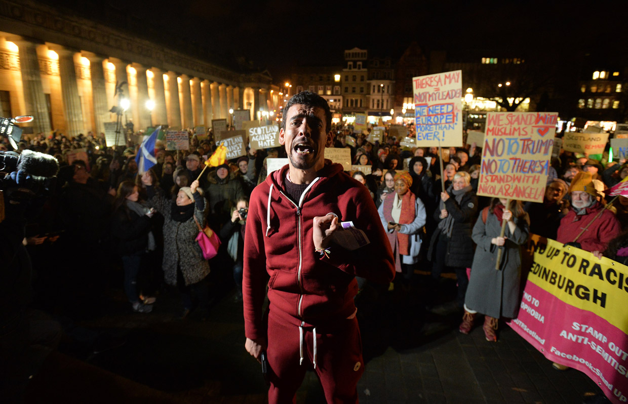 EDINBURGH, SCOTLAND - JANUARY 30: A young Muslim man speaks passionately to the crowd at the Mound as demonstrators march to the Scottish Parliament to protest against US President Trump's Muslim travel ban to the USA on January 30, 2017 in Edinburgh, Scotland. President Trump signed an executive order on Friday banning immigration to the USA from seven muslim countries. This led to protests across America and, today, the UK. A British petition asking for the downgrading of Trump's State visit passed one million signatures this morning. (Photo by Mark Runnacles/Getty Images)