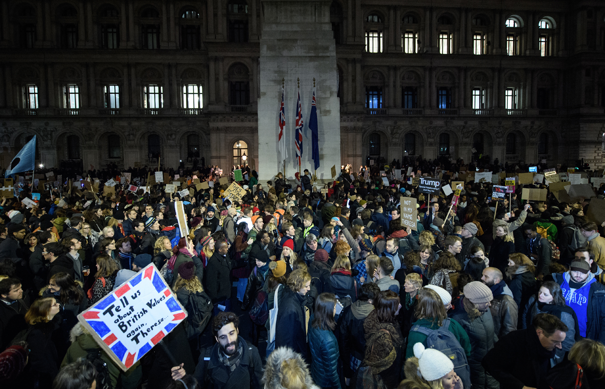 LONDON, ENGLAND - JANUARY 30: Protestors gather in their thousands outside Downing Street on January 30, 2017 in London, England. President Trump signed an executive order on Friday banning immigration to the USA from seven Muslim countries. This led to protests across America and, today, in the UK., a British petition asking for the downgrading of Trump's State visit passed one million signatures this morning. (Photo by Leon Neal/Getty Images)