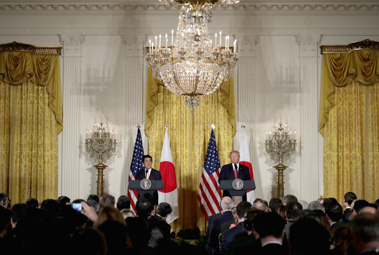 WASHINGTON, DC - FEBRUARY 10: U.S. President Donald Trump (R) holds a joint press conference with Japan Prime Minister Shinzo Abe in the East Room at the White House on February 10, 2017 in Washington, DC. This is Abe's first official visit during the Trump administration. (Photo by Chip Somodevilla/Getty Images)