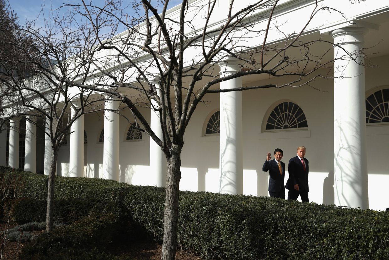WASHINGTON, DC - FEBRUARY 10: (AFP OUT) U.S. President Donald Trump and Japan Prime Minister Shinzo Abe walk together to their joint press conference in the East Room at the White House on February 10, 2017 in Washington, DC. This is Abe's first official visit during the Trump administration. (Photo by Chip Somodevilla/Getty Images)
