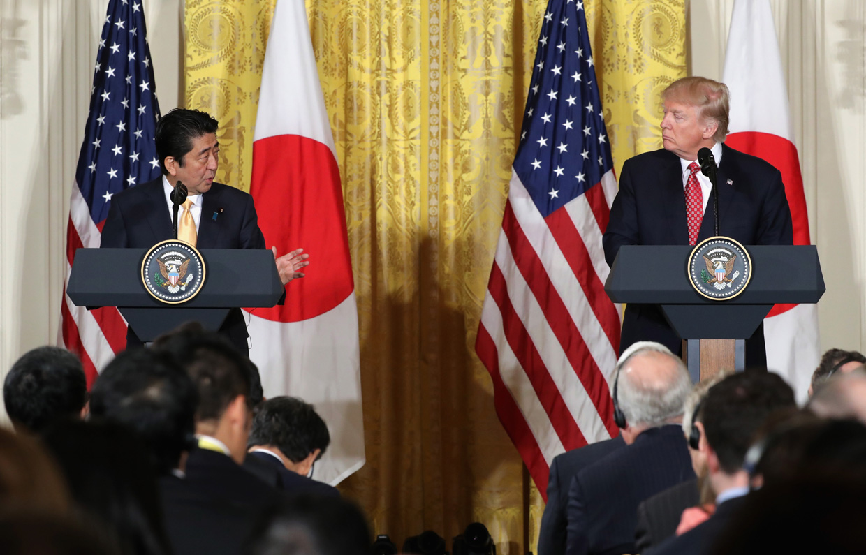 WASHINGTON, DC - FEBRUARY 10: U.S. President Donald Trump (R) holds a joint press conference with Japan Prime Minister Shinzo Abe in the East Room at the White House on February 10, 2017 in Washington, DC. This is Abe's first official visit during the Trump administration. (Photo by Chip Somodevilla/Getty Images)