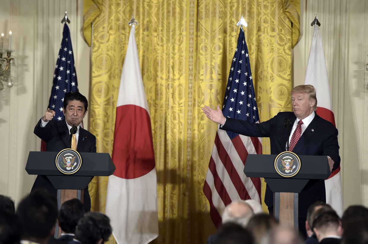 US President Donald Trump and Japanese Prime Minister Shinzo Abe hold a joint press conference on February 10, 2017, at the White House in Washington, DC. / AFP / Brendan SMIALOWSKI (Photo credit should read BRENDAN SMIALOWSKI/AFP/Getty Images)