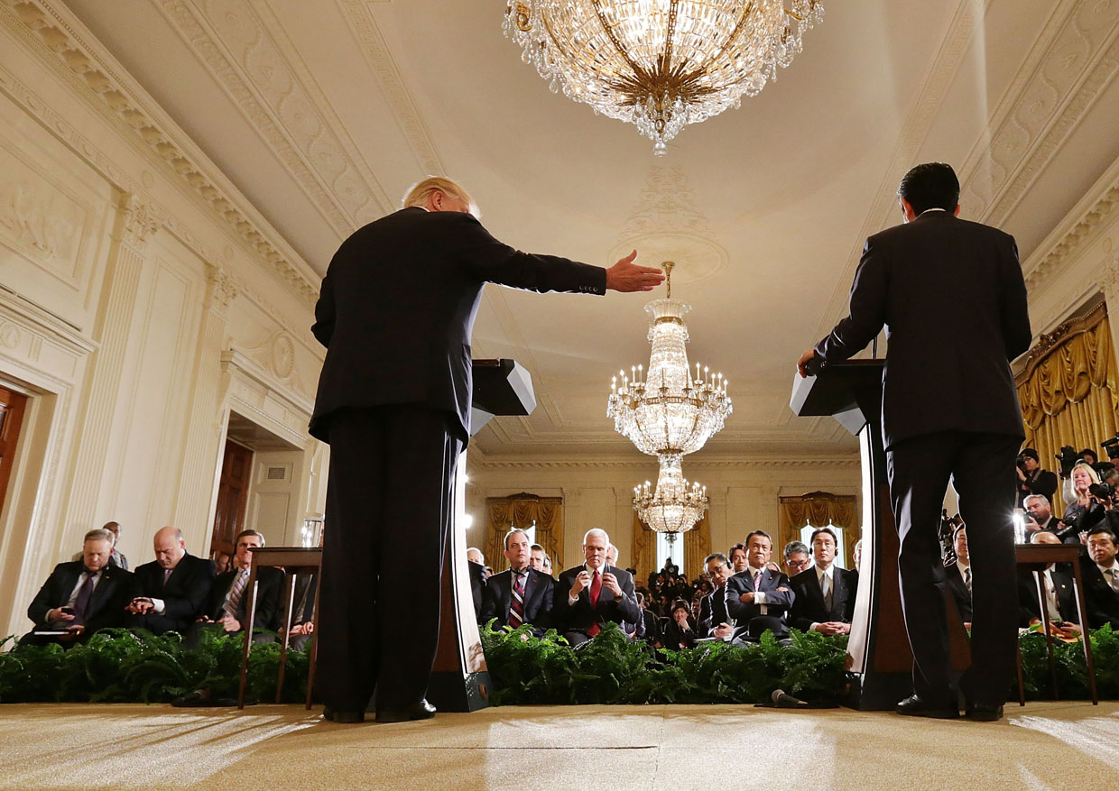 WASHINGTON, DC - FEBRUARY 10: U.S. President Donald Trump and Japanese Prime Minister Shinzo Abe hold a joint news conference in the East Room at the White House February 10, 2017 in Washington, DC. Trump and Abe held bilateral meetings earlier in the day and discussed many issues, including trade and security ties. (Photo by Chip Somodevilla/Getty Images)