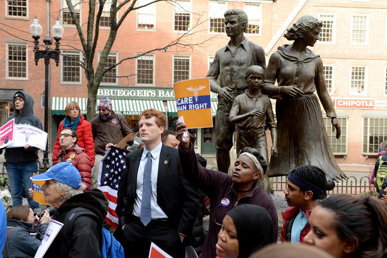 BOSTON, MA - FEBRUARY 21: U.S. Representative Joe Kennedy III joined protestors at a rally against the Trump administration at the Boston Irish Famine Memorial on February 21, 2017 in Boston, Massachusetts. The protest, called "We Will Persist," was put on by Massachusetts workers, immigrants, and community activists. (Photo by Darren McCollester/Getty Images)