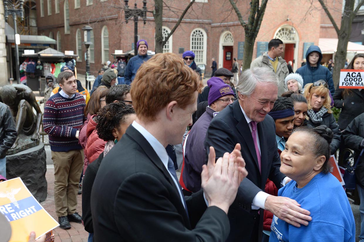 BOSTON, MA - FEBRUARY 21: U.S. Senator Edward Markey (D-MA) hugs a woman after she spoke at a rally against the Trump administration as U.S. Representative Joe Kennedy III (D-MA) looks on at the Boston Irish Famine Memorial on February 21, 2017 in Boston, Massachusetts. The protest, called "We Will Persist," was put on by Massachusetts workers, immigrants, and community activists. (Photo by Darren McCollester/Getty Images)