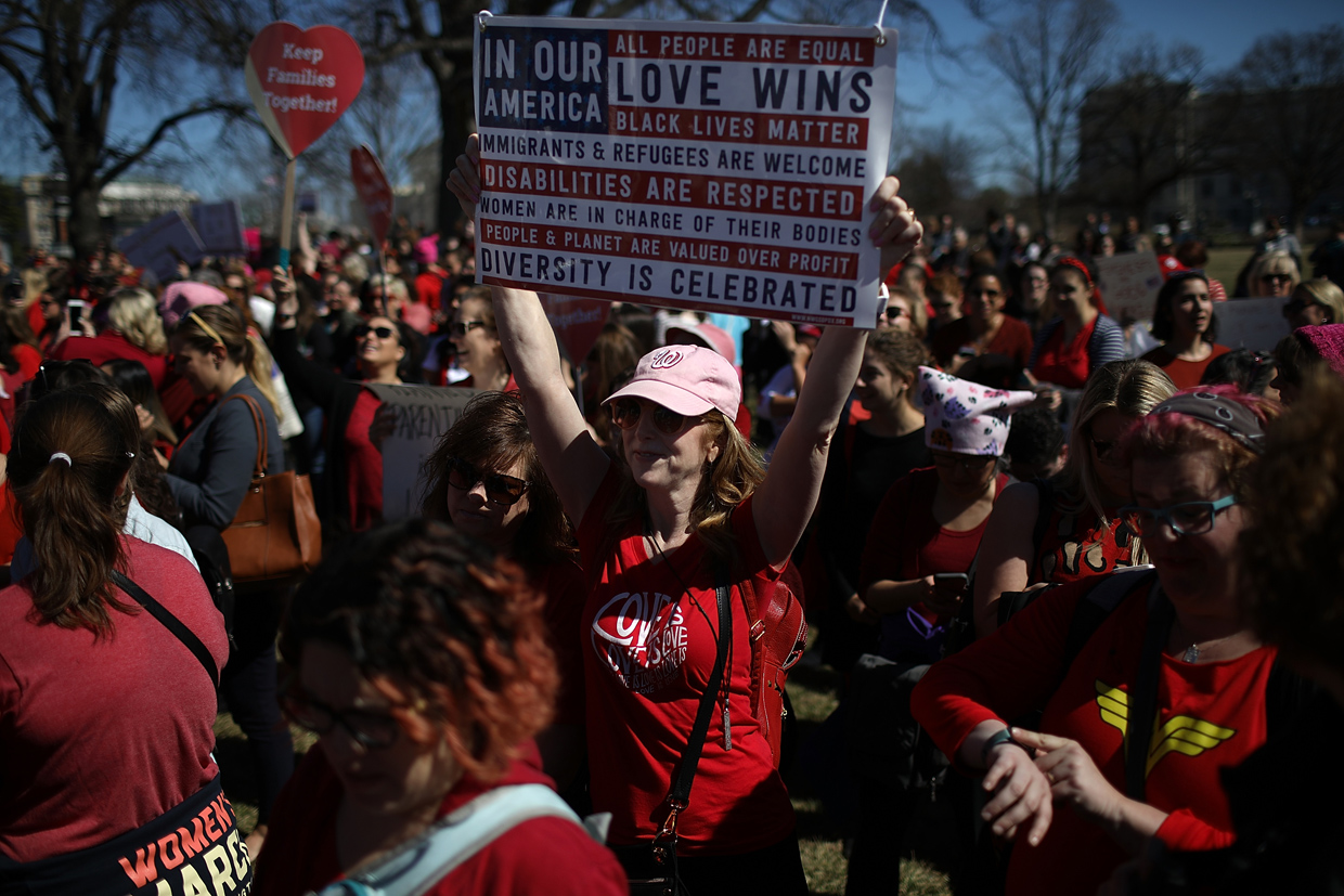 WASHINGTON, DC - MARCH 08: Supporters of women's rights gather for a press conference outside the U.S. Capitol where women members of the House Democratic caucus marked International WomenÕs Day and ÒA Day Without a WomanÓ March 8, 2017 at the U.S. Capitol in Washington, DC. During remarks, House Minority Leader Nancy Pelosi urged continued efforts to strengthen womenÕs rights across the country. (Photo by Win McNamee/Getty Images)