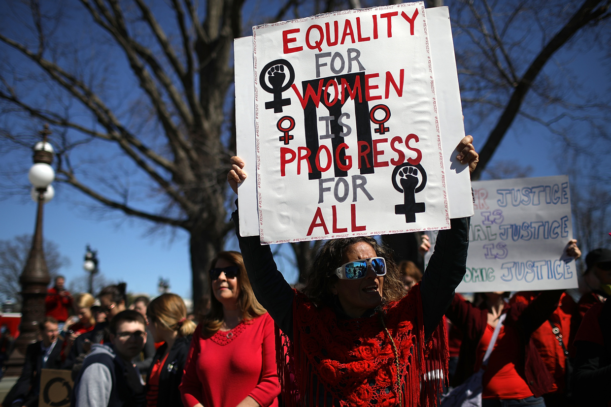 WASHINGTON, DC - MARCH 08: Supporters of women's rights gather for a news conference outside the U.S. Capitol where women members of the House Democratic caucus marked International Women's Day and A Day Without a Woman March 8, 2017 at the U.S. Capitol in Washington, DC. During remarks, House Minority Leader Nancy Pelosi urged continued efforts to strengthen womenÕs rights across the country. (Photo by Win McNamee/Getty Images)