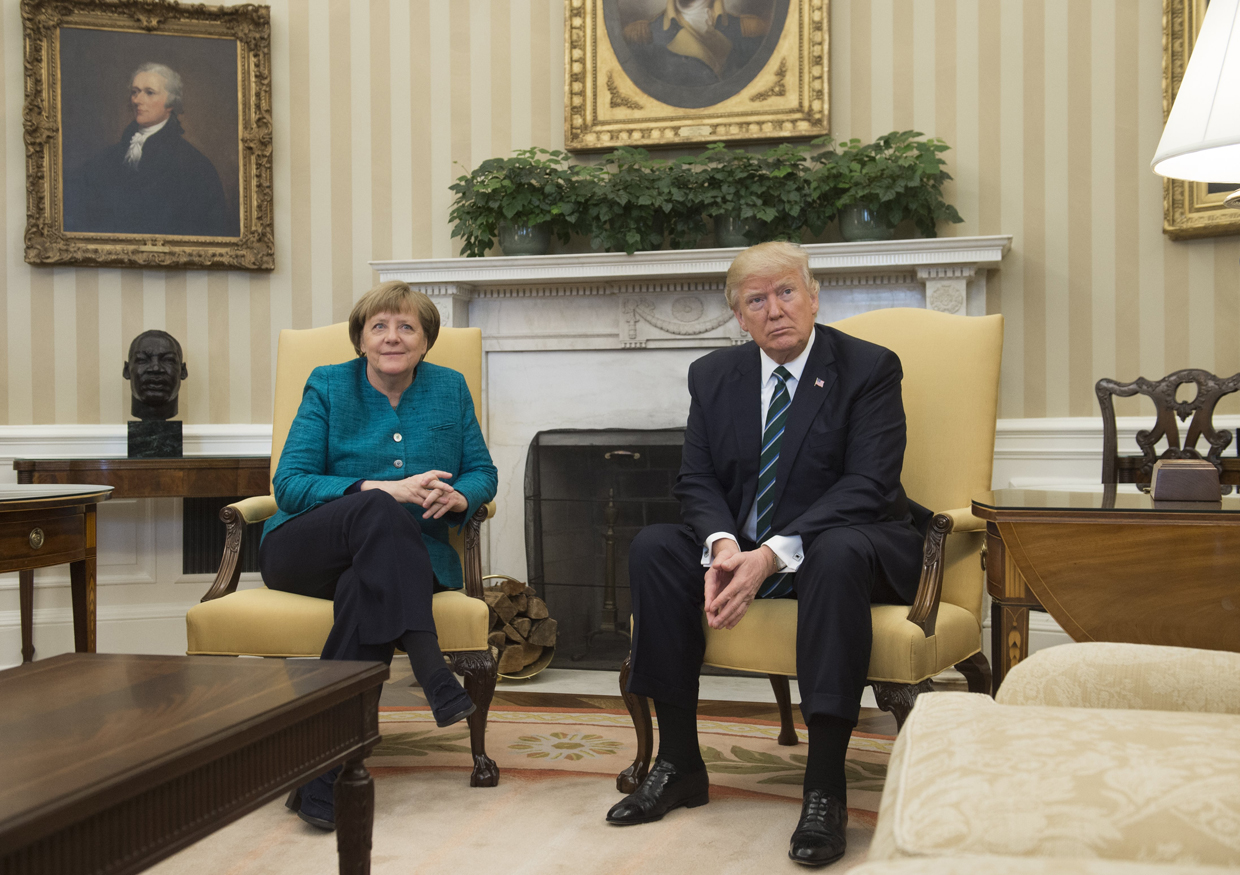 US President Donald Trump and German Chancellor Angela Merkel meet in the Oval Office of the White House in Washington, DC, on March 17, 2017. / AFP PHOTO / SAUL LOEB (Photo credit should read SAUL LOEB/AFP/Getty Images)