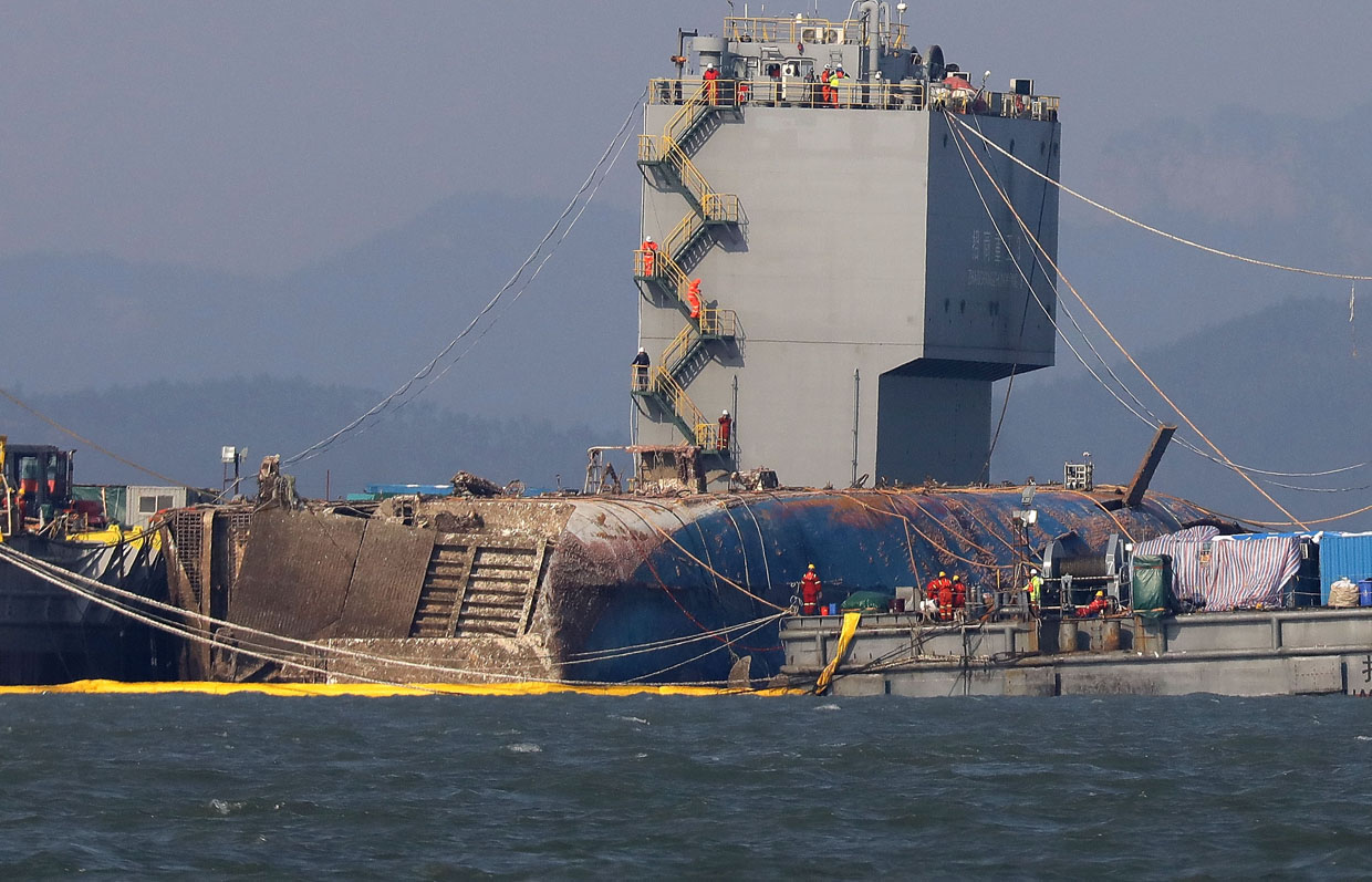 JINDO-GUN, SOUTH KOREA - MARCH 23: Submersible vessel attempts to salvage sunken Sewol ferry in waters off Jindo, on March 23, 2017 in Jindo-gun, South Korea. The Sewol sank off the Jindo Island in April 2014 leaving more than 300 people dead and nine of them still remain missing. (Photo by Chung Sung-Jun/Getty Images)
