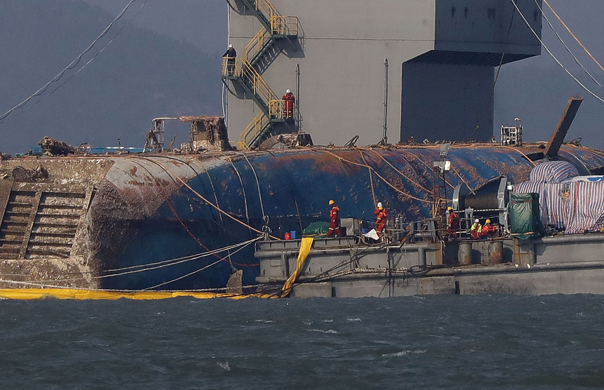 JINDO-GUN, SOUTH KOREA - MARCH 23: Submersible vessel attempts to salvage sunken Sewol ferry in waters off Jindo, on March 23, 2017 in Jindo-gun, South Korea. The Sewol sank off the Jindo Island in April 2014 leaving more than 300 people dead and nine of them still remain missing. (Photo by Chung Sung-Jun/Getty Images)