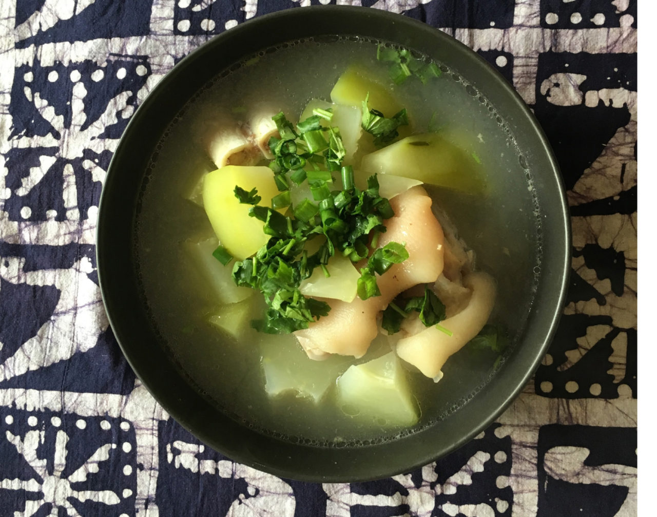 Green papaya soup with slow-cooked pig feet, one of the dishes that helps mothers with breast milk's nourishment. (Photo: Khanh Hoa Nguyen)