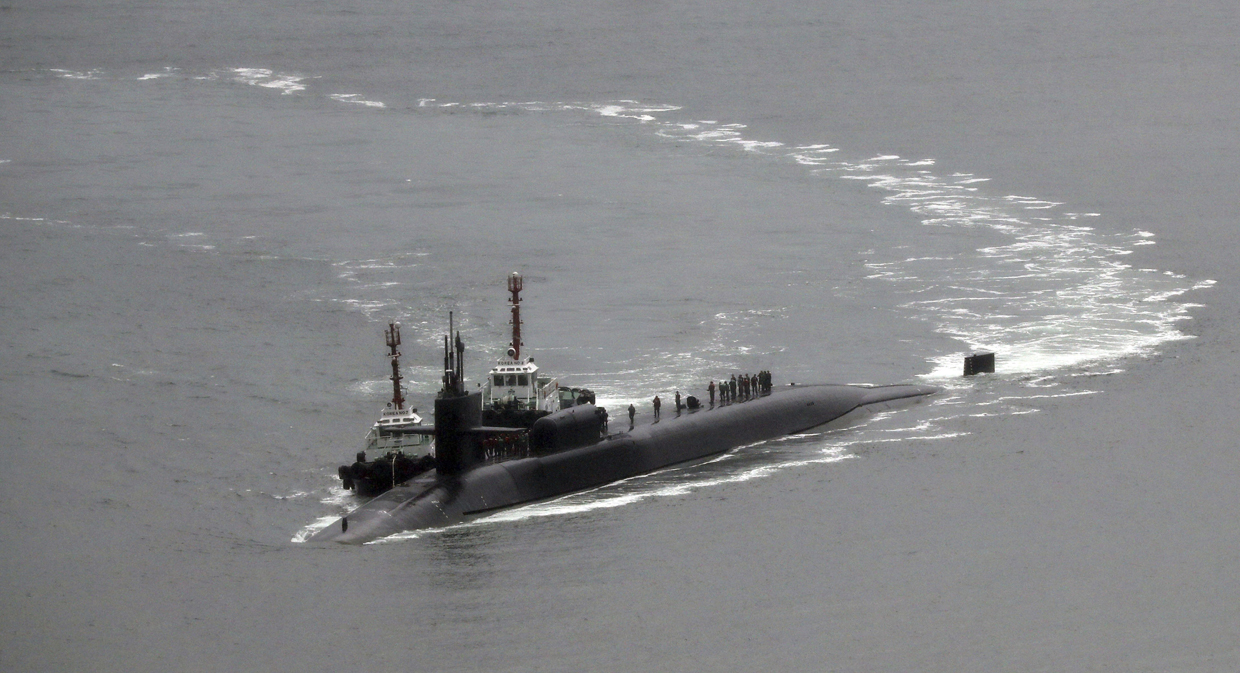 The nuclear-powered submarine USS Michigan approaches to join the U.S. aircraft carrier USS Carl Vinson in drills near the Korean Peninsula, at Busan port in Busan, South Korea, Tuesday, April 25, 2017. North Korea marks the founding anniversary of its military on Tuesday, and South Korea and its allies are bracing for the possibility that it could conduct another nuclear test or launch an intercontinental ballistic missile for the first time. (Jo Jung-ho/Yonhap via AP)