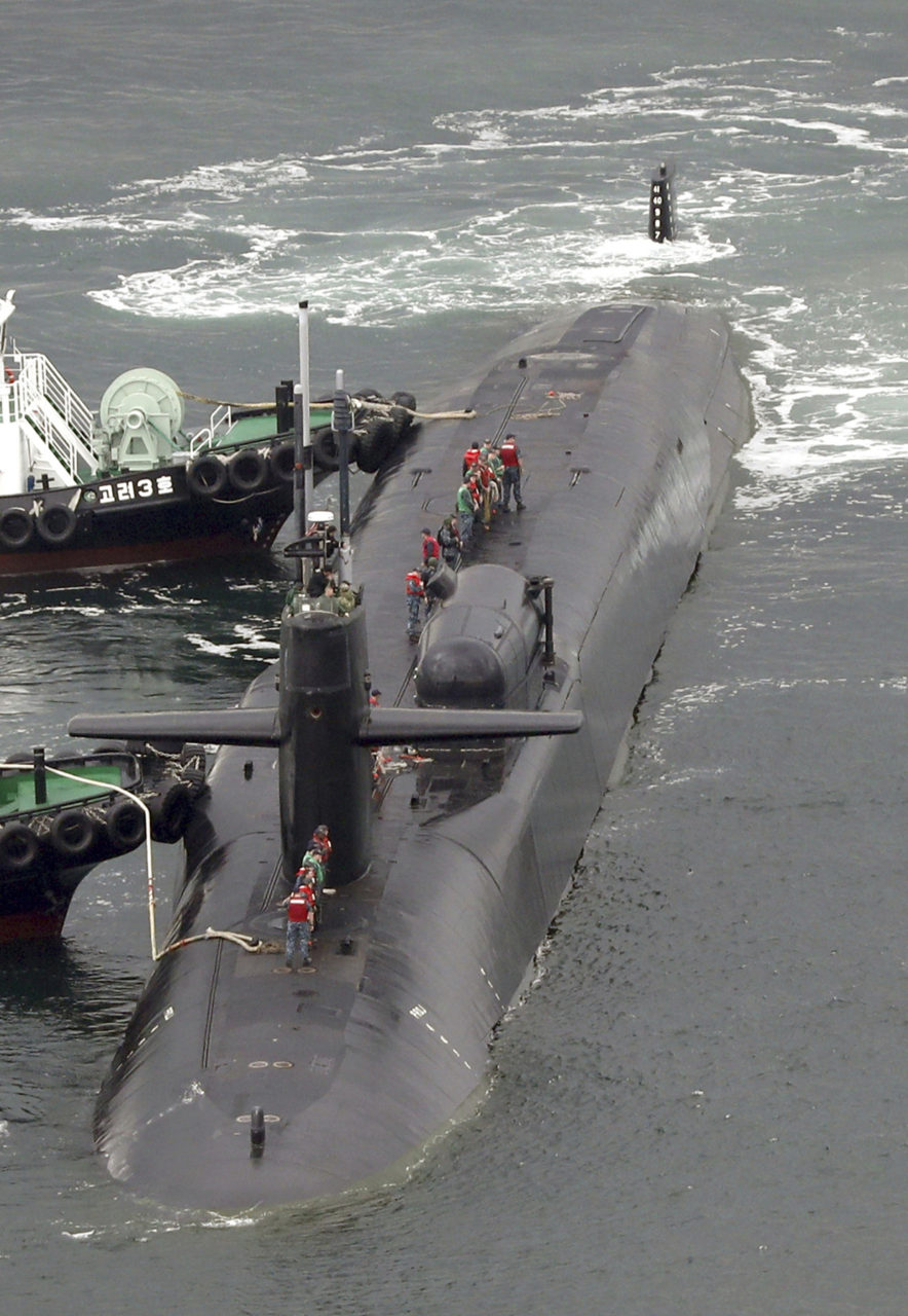 The nuclear-powered submarine USS Michigan approaches to join the U.S. aircraft carrier USS Carl Vinson in drills near the Korean Peninsula, at Busan port in Busan, South Korea, Tuesday, April 25, 2017. North Korea marks the founding anniversary of its military on Tuesday, and South Korea and its allies are bracing for the possibility that it could conduct another nuclear test or launch an intercontinental ballistic missile for the first time. (Jo Jung-ho/Yonhap via AP)