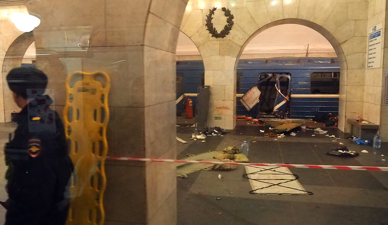 TOPSHOT - A picture shows the damaged train carriage at Technological Institute metro station in Saint Petersburg on April 3, 2017. Around 10 people were feared dead and dozens injured Monday after an explosion rocked the metro system in Russia's second city Saint Petersburg, according to authorities, who were not ruling out a terror attack. / AFP PHOTO / STR (Photo credit should read STR/AFP/Getty Images)