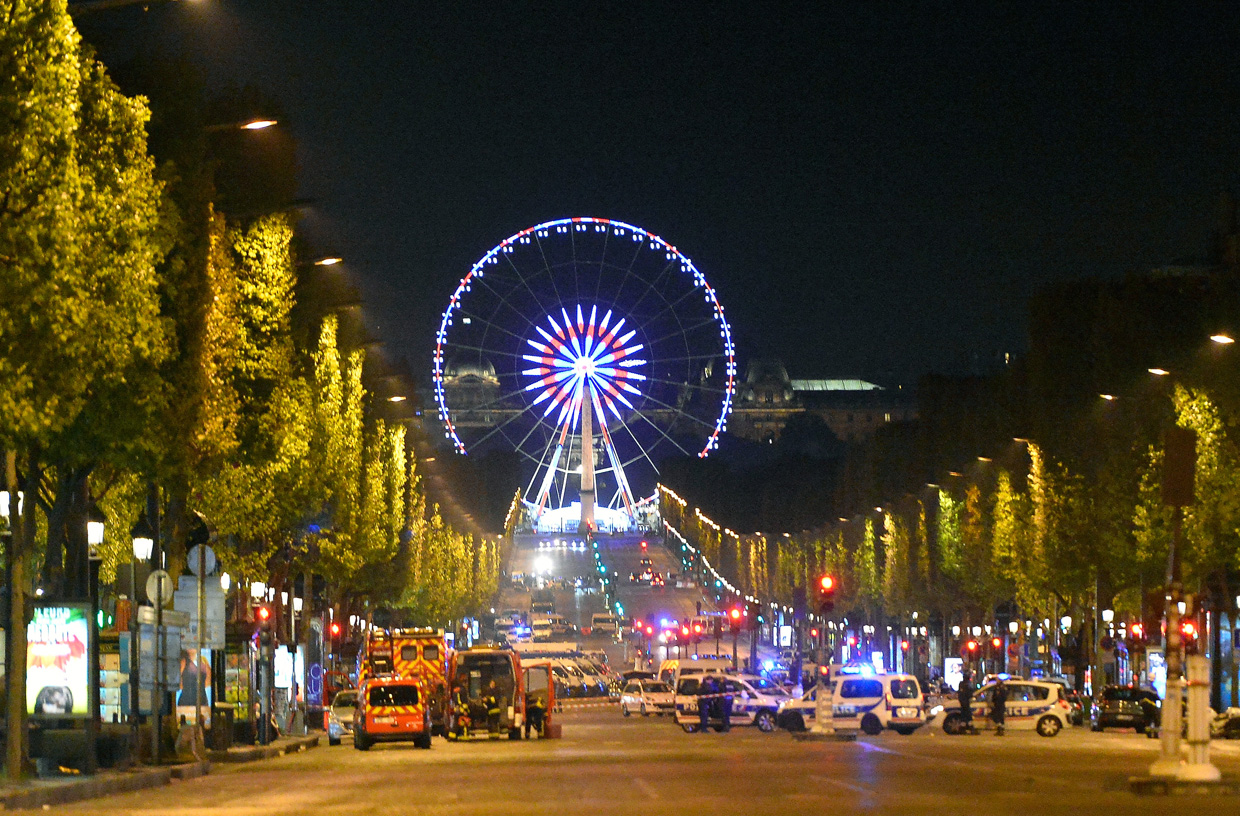 PARIS, FRANCE - APRIL 20: Police secure the area after a gunman opened fire on Champs Elysees on April 20, 2017 in Paris, France. One police officer has been killed, and a second injured by a gunman on The Champs Elysees. Security is heightened in Paris with the first round of France's presidential election on Sunday. (Photo by Aurelien Meunier/Getty Images)
