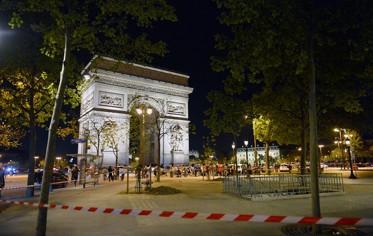 PARIS, FRANCE - APRIL 20: Police secure the area after a gunman opened fire on Champs Elysees on April 20, 2017 in Paris, France. One police officer has been killed, and a second injured by a gunman on The Champs Elysees. Security is heightened in Paris with the first round of France's presidential election on Sunday. (Photo by Aurelien Meunier/Getty Images)