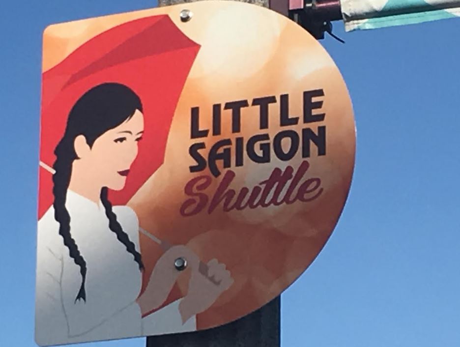 Signage of the free shuttle's stop in Little Saigon