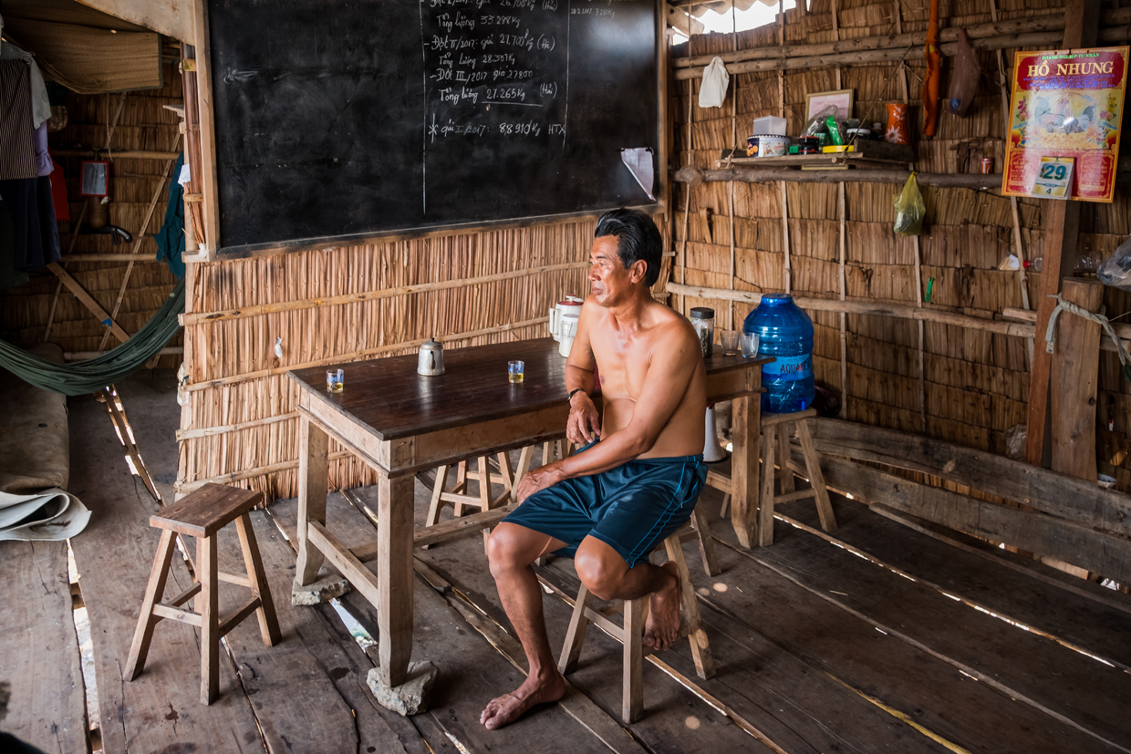 BEN TRE, VIETNAM - APRIL 29: Vo Van Phuong, 54, sits at his clam guard hut next to the seafront on April 29, 2017 in Bao Thuan Village, Ba Tri District, Ben Tre Province, Vietnam. He said he got to move this hut closer in land every year due to the rising sea level. The Mekong River Delta is amongst the most vulnerable regions in South Vietnam, which is home to more than 17 million people and produces around half of the country's rice harvest with its fertile fields. However, climate change is causing the rise of salt content of water in land that has ben used for rice paddies, coconut groves and other crops, threatening the livelihoods of millions of farmers and fishermen. The Vietnamese government report have stated that 40 percent of the delta could be submerged if sea levels rise by one-meter in decades to come while residents in the low-lying delta have already been affected by more frequent typhoons and heavier floods that could potentially drive hundreds of thousands of people from their homes, according to reports. As many locals have been forced to abandon their rice cultivation due to salinization and risk their livelihood on other ventures such as shrimp farming, reports also state that cycles and storms linked to climate change would not only risk the Mekong Delta, but also up to the coffee crops in the highlands as well as the Red River Delta in the north, affecting large areas near the country's capital, Hanoi. (Photo by Linh Pham/Getty Images)