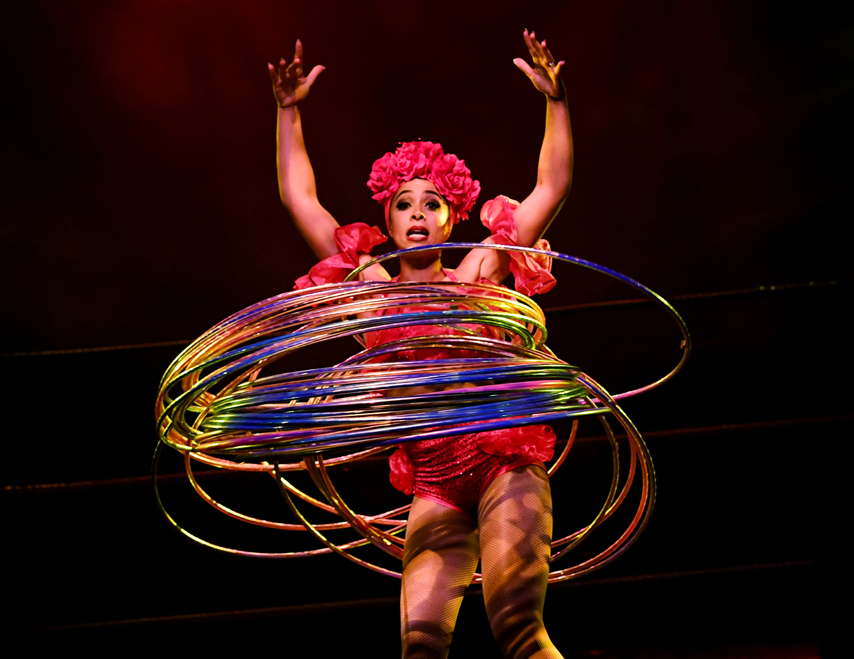 Performer Marawa 'the Amazing', who holds the world record for the most hoola hoops used in a performance (200), dances during a special Cinco de Mayo show by the Lucha Vavoom ensemble in Los Angeles, California on May 4, 2017. Cinco de Mayo commemorates the Mexican Army's unexpected victory over French forces in 1862. In the US the festival is a celebration of Mexican-American culture. / AFP PHOTO / Mark RALSTON (Photo credit should read MARK RALSTON/AFP/Getty Images)