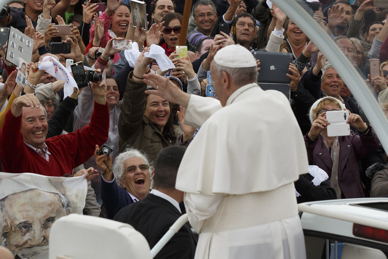 FATIMA, PORTUGAL - MAY 12: Pope Francis waves as he leaves the Sanctuary of Fatima on May 12, 2017 in Fatima, Portugal. Pope Francis will be attending the Sanctuary of Fatima, in Portugal, on May 12 and 13 to canonize two Portuguese shepherds, Jacinta and Francisco Marto, who are said to have witnessed the apparition of what they believed was the Virgin Mary, together with their aunt Lucia Santos, during the 100 anniversary of the event. Thousands of pilgrims and worshippers from around the world are expected to gather at the centenary celebration. (Photo by Pablo Blazquez Dominguez/Getty Images)