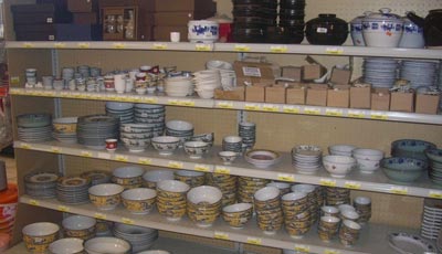 You can purchase fine pottery in the same vicinity as live octopus and fermented duck eggs