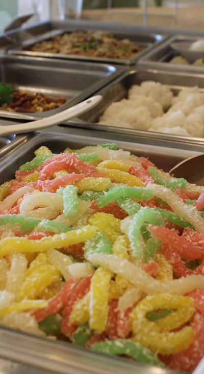 This colorful dessert is made from taro and dusted with coconut shavings.